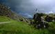 Flag at &THORN;ingvellir with heavy clouds